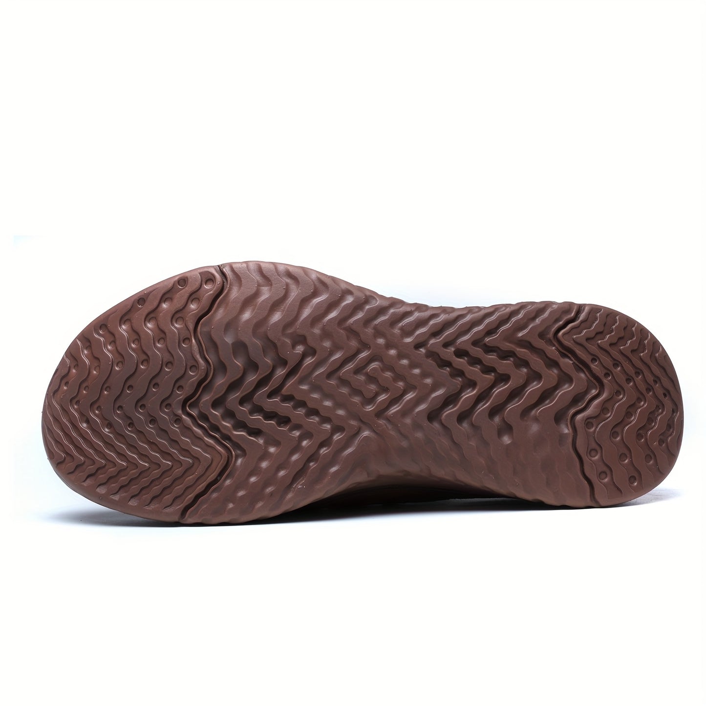 Brown shoe sole with tread pattern on a white background
