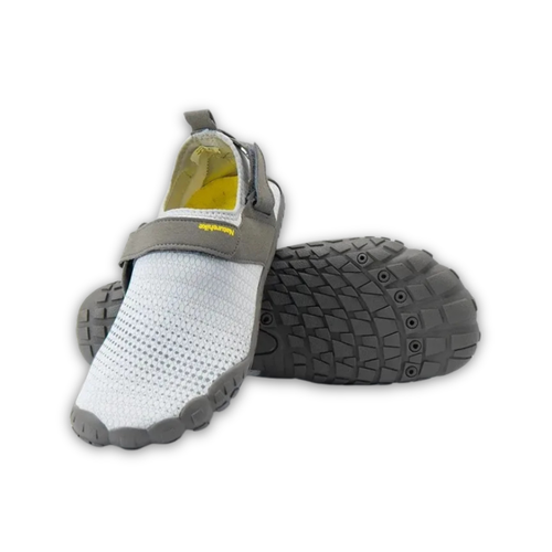 Gray and white shoe with textured sole on a white background